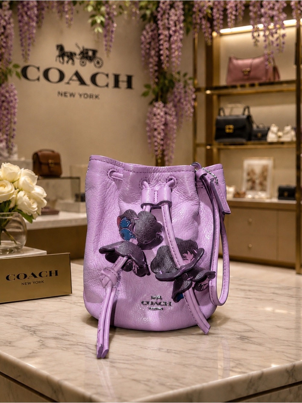 Coach Lavender Floral Appliqué Drawstring Mini Bucket Bag